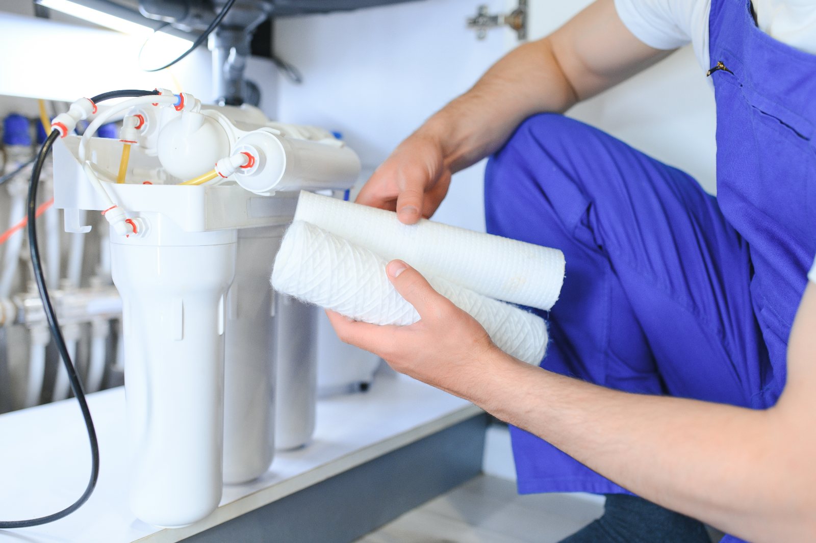 Technician checking a water purifier